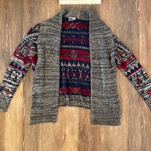 Patterned cardigan sweater.